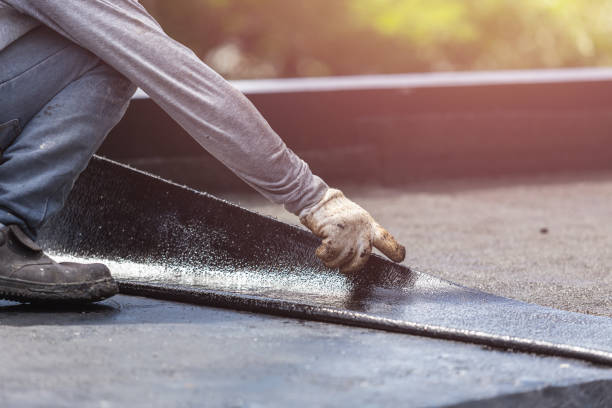 Professional Waterproofing technician working in Springville, NY